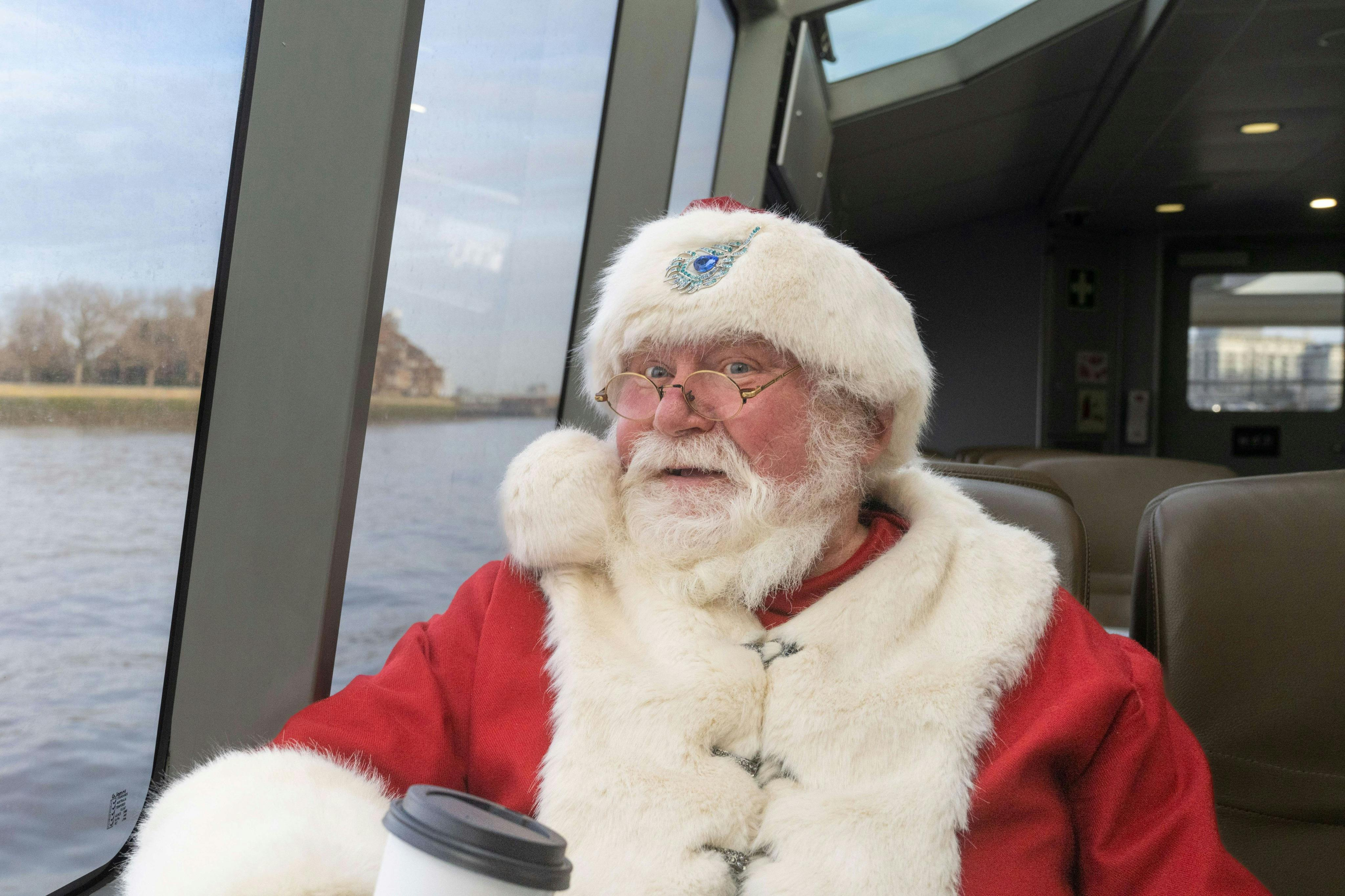 London: Christmas Lights Bus & Hop-on Hop-off Boat Tour - Photo 1 of 7